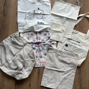 Assorted Reusable book bags, totes & dust covers